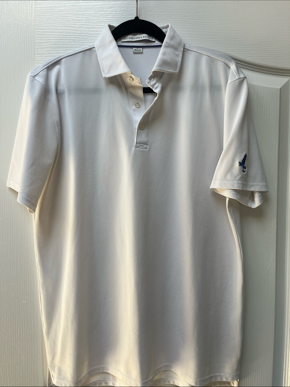 Men's White Short-Sleeve Polo with Subtle Sleeve Emblem